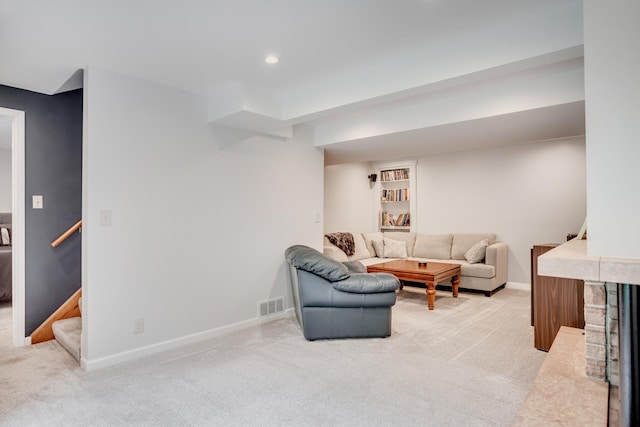 1030 Idaho Ave N, Golden Valley, MN 55427 - living area featuring light carpet, stairway, recessed lighting, and a fireplace