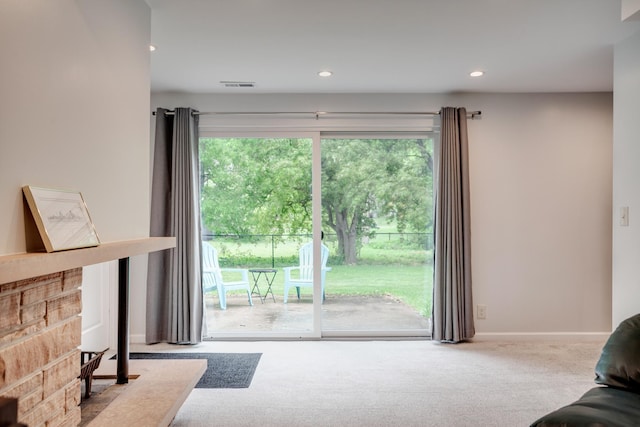1030 Idaho Ave N, Golden Valley, MN 55427 - carpeted living room with healthy amount of natural light and recessed lighting
