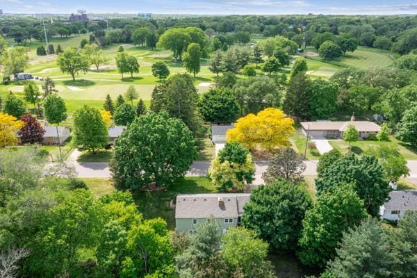 1030 Idaho Ave N, Golden Valley, MN 55427 - drone / aerial view of a local golf course and a tree filled landscape