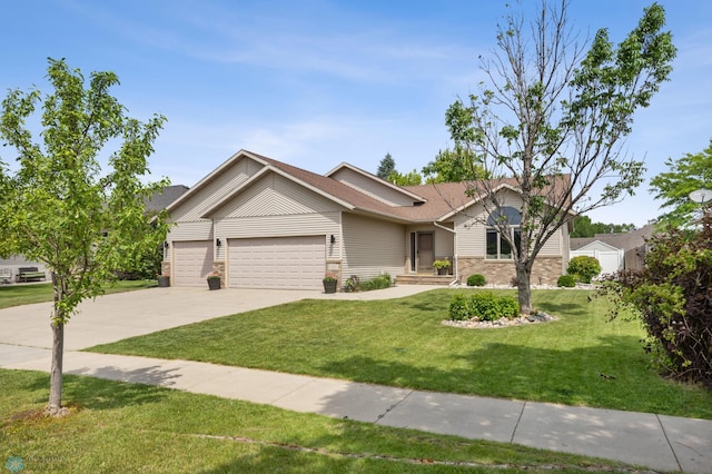 1421 55th Ave S, Fargo, ND 58104 - ranch-style home featuring a garage, a front lawn, and concrete driveway