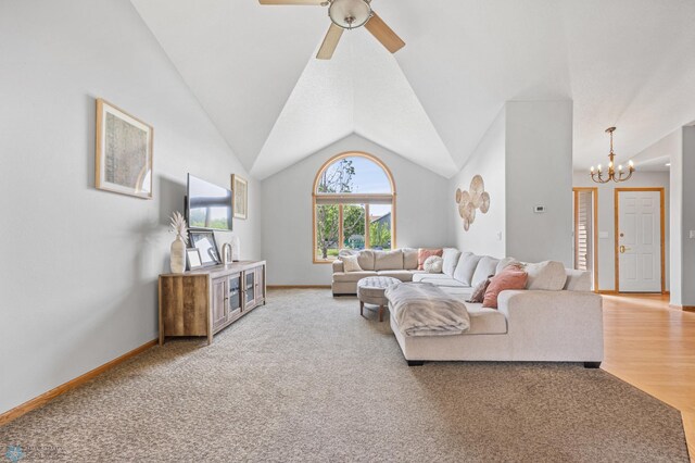 1421 55th Ave S, Fargo, ND 58104 - living room with a chandelier, lofted ceiling, ceiling fan, and light carpet
