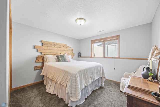 1421 55th Ave S, Fargo, ND 58104 - carpeted bedroom with baseboards and a textured ceiling