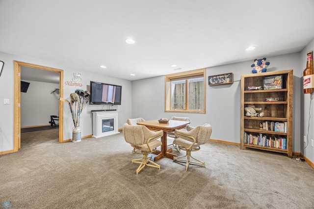 1421 55th Ave S, Fargo, ND 58104 - dining area featuring a glass covered fireplace, carpet, and recessed lighting