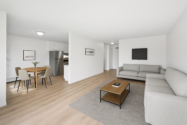 4101 Parklawn Ave Unit 320, Edina, MN 55435 - living area with light wood finished floors and baseboard heating