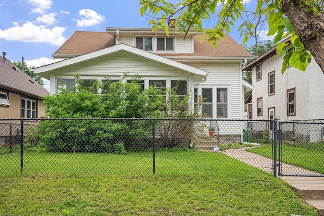 3734 Emerson Ave N, Minneapolis, MN 55412 - rear view of property featuring a gate