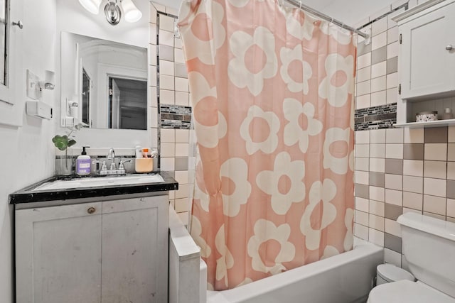 3734 Emerson Ave N, Minneapolis, MN 55412 - bathroom featuring tile walls, shower / bathtub combination with curtain, vanity, and tasteful backsplash