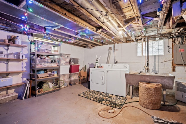 3734 Emerson Ave N, Minneapolis, MN 55412 - basement featuring separate washer and dryer and electric panel