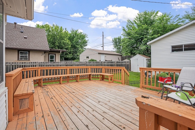 3734 Emerson Ave N, Minneapolis, MN 55412 - wooden deck with a fenced backyard and a storage unit