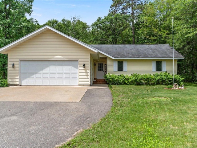 31591 Summer Dr, Breezy Point, MN 56472 - ranch-style house featuring driveway, a front yard, and an attached garage