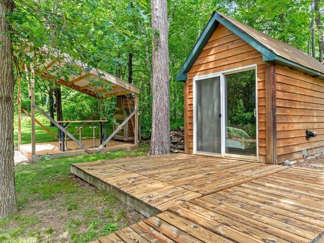 31591 Summer Dr, Breezy Point, MN 56472 - wooden deck featuring an outdoor structure