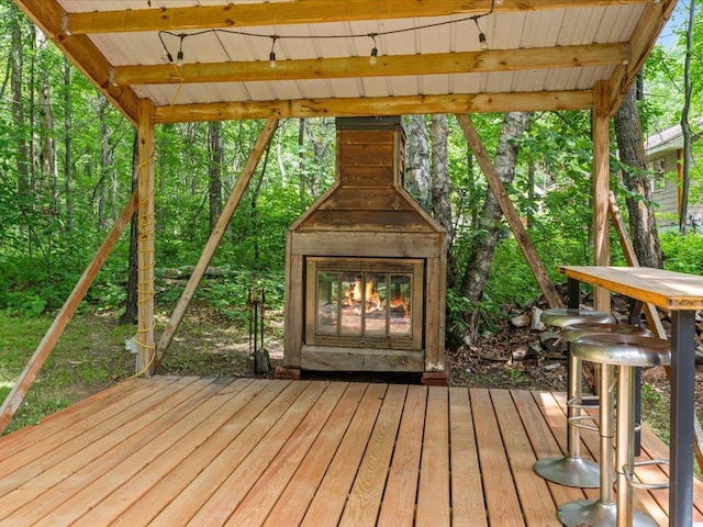31591 Summer Dr, Breezy Point, MN 56472 - deck featuring a glass covered fireplace