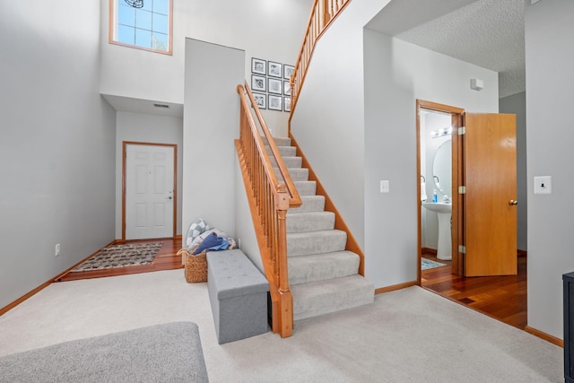 1343 Yorkshire Ln, Shakopee, MN 55379 - carpeted foyer featuring stairway and a towering ceiling