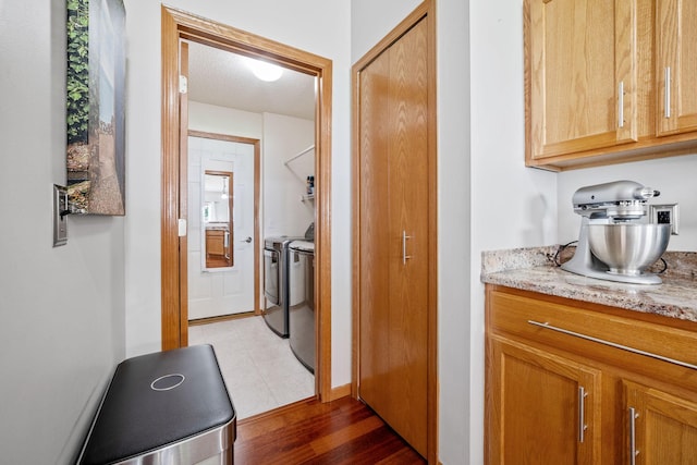 1343 Yorkshire Ln, Shakopee, MN 55379 - corridor featuring washer and dryer and light wood-type flooring
