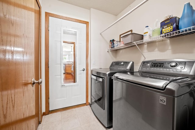 1343 Yorkshire Ln, Shakopee, MN 55379 - washroom with independent washer and dryer and light tile patterned flooring
