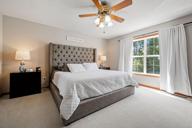 1343 Yorkshire Ln, Shakopee, MN 55379 - carpeted bedroom featuring ceiling fan and a textured ceiling