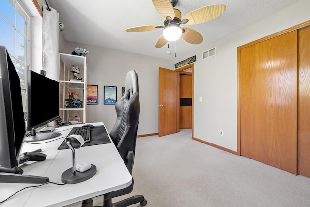 1343 Yorkshire Ln, Shakopee, MN 55379 - home office featuring a ceiling fan and light colored carpet