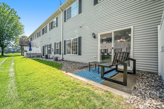 1343 Yorkshire Ln, Shakopee, MN 55379 - back of house with a yard, a patio area, and a wooden deck