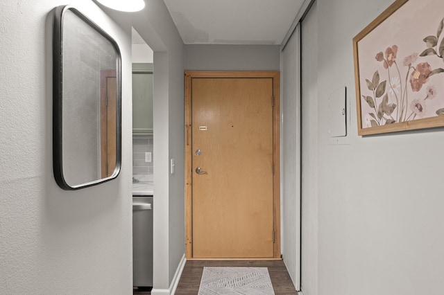4500 Cedar Lake Rd S Unit 1, Saint Louis Park, MN 55416 - entryway featuring dark wood-style floors and baseboards