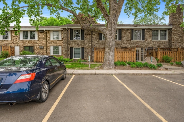 4500 Cedar Lake Rd S Unit 1, Saint Louis Park, MN 55416 - townhome / multi-family property featuring uncovered parking and brick siding