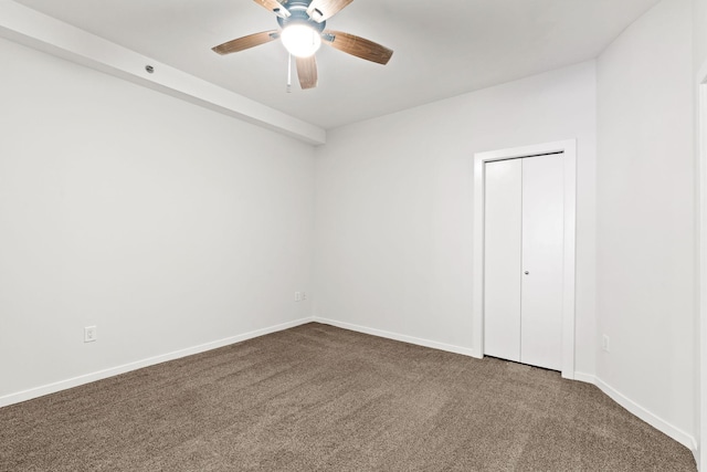 408 1st St Unit 310, Minneapolis, MN 55401 - spare room featuring dark carpet and ceiling fan