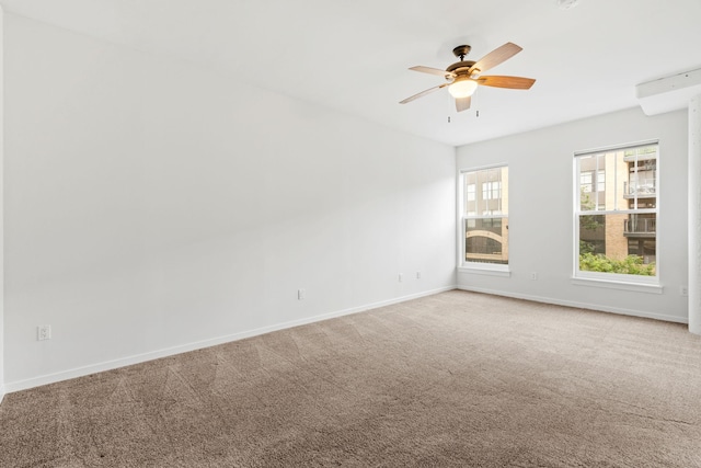 408 1st St Unit 310, Minneapolis, MN 55401 - carpeted spare room with ceiling fan and baseboards