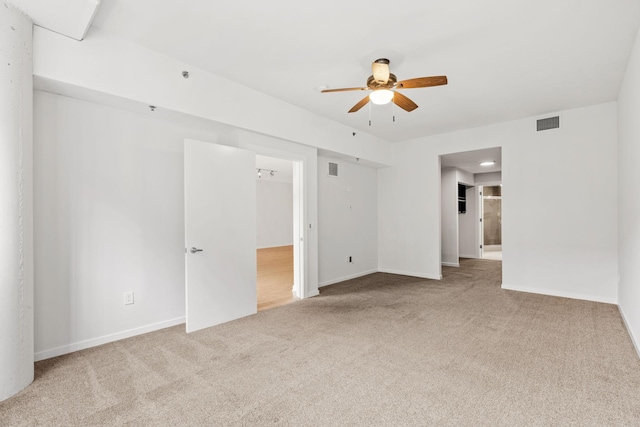 408 1st St Unit 310, Minneapolis, MN 55401 - carpeted empty room featuring a ceiling fan and baseboards