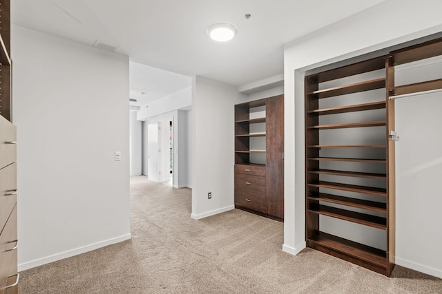 408 1st St Unit 310, Minneapolis, MN 55401 - unfurnished bedroom with light carpet and baseboards