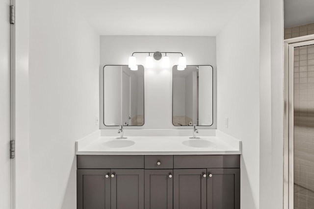 408 1st St Unit 310, Minneapolis, MN 55401 - bathroom featuring double vanity and tiled shower