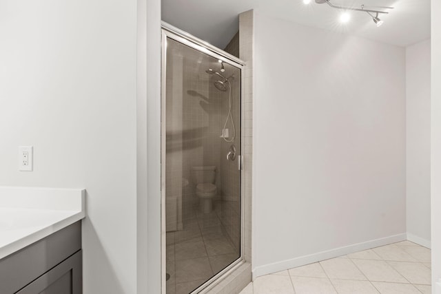 408 1st St Unit 310, Minneapolis, MN 55401 - full bathroom with a stall shower, vanity, and tile patterned floors