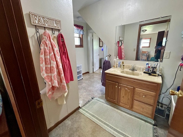 31231 568th Ave, Deer Creek Twp, MN 56527 - bathroom featuring vanity and baseboards
