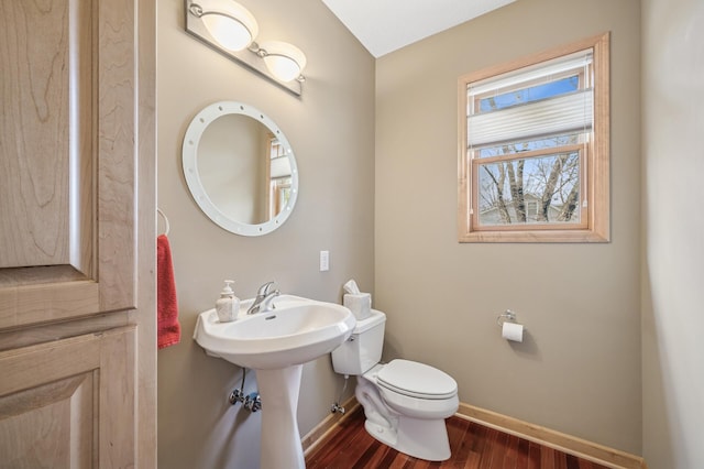 2011 117th Ln NE, Blaine, MN 55449 - bathroom with baseboards and wood finished floors