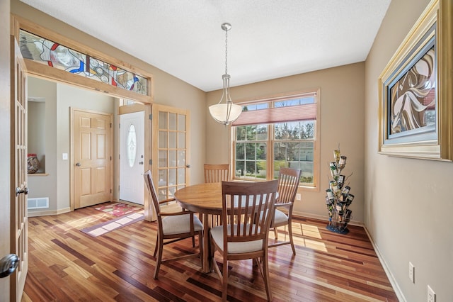 2011 117th Ln NE, Blaine, MN 55449 - dining area featuring light wood finished floors