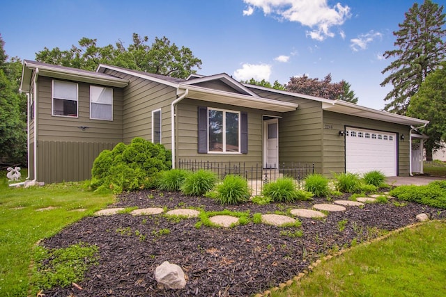 2246 Vivian Ln, Saint Paul, MN 55119 - view of front facade featuring an attached garage