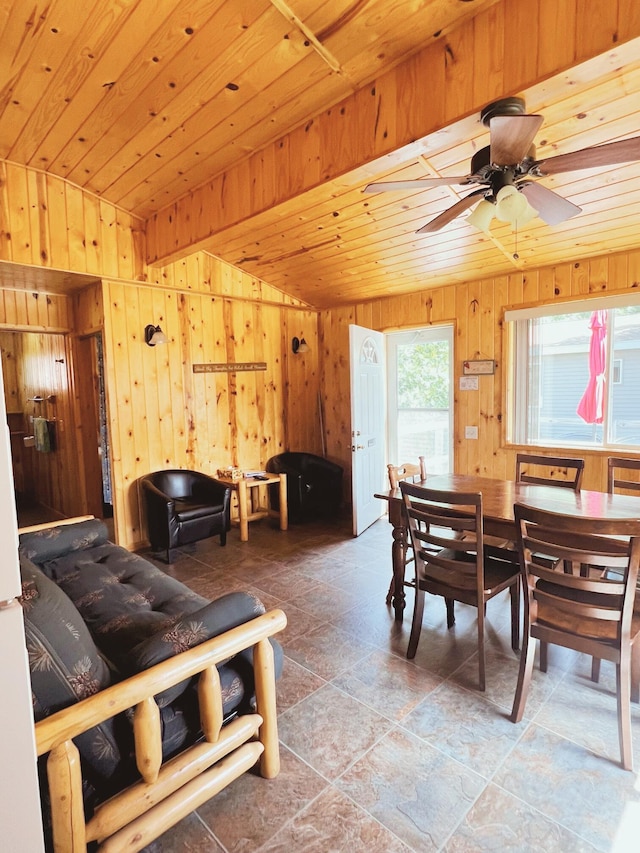 35686 Rush Lake Loop Unit 9, Rush Lake Twp, MN 56571 - dining room with wooden walls, stone finish floors, a ceiling fan, and wooden ceiling
