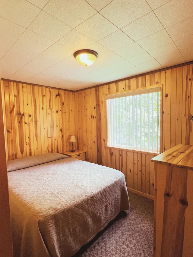 35686 Rush Lake Loop Unit 9, Rush Lake Twp, MN 56571 - carpeted bedroom with wooden walls and baseboards