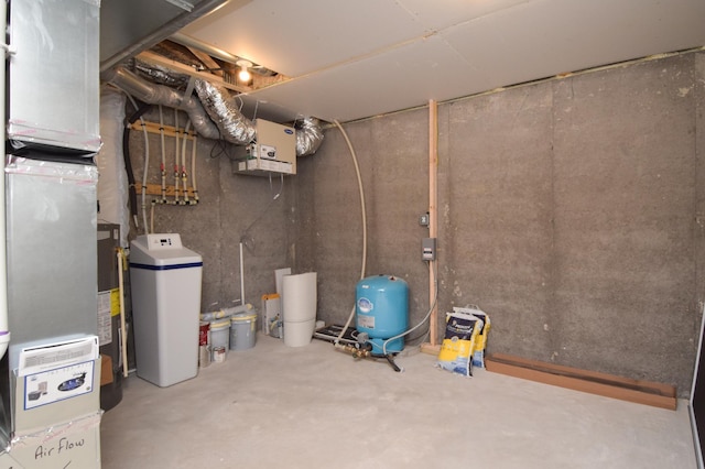 21207 Tippecanoe St NE, East Bethel, MN 55011 - unfinished basement with a water softener, a water pressure tank, and heating unit