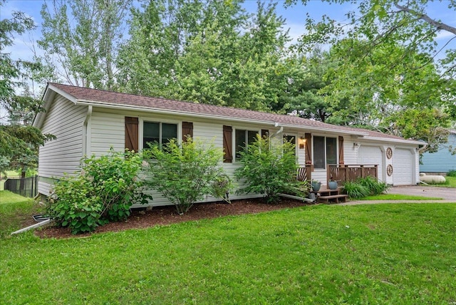 1145 Norton St, Hammond, WI 54015 - ranch-style home featuring a front yard, a garage, and driveway