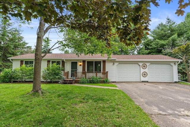 1145 Norton St, Hammond, WI 54015 - ranch-style house with an attached garage, a front yard, driveway, and covered porch