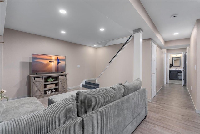 1145 Norton St, Hammond, WI 54015 - living area featuring light wood-type flooring, recessed lighting, and stairway