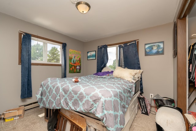 33406 151st Ave, Montgomery, MN 56069 - carpeted bedroom with multiple windows and baseboard heating