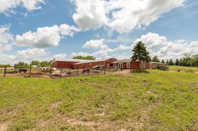 33406 151st Ave, Montgomery, MN 56069 - view of yard featuring an outbuilding, an exterior structure, and a view of countryside