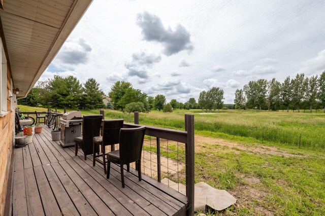 33406 151st Ave, Montgomery, MN 56069 - wooden deck with area for grilling and a view of rural / pastoral area