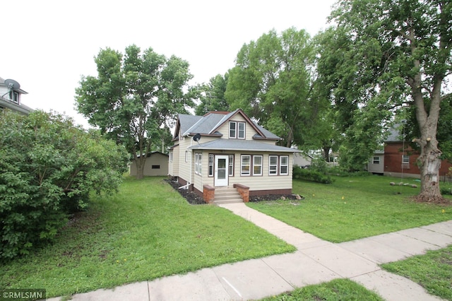 209 Cleveland St SW, Silver Lake, MN 55381 - bungalow-style house featuring a front lawn