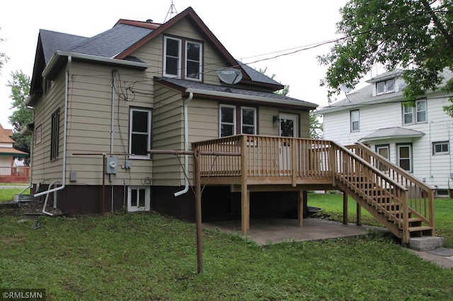 209 Cleveland St SW, Silver Lake, MN 55381 - back of house featuring a wooden deck, a lawn, roof with shingles, a patio, and stairway