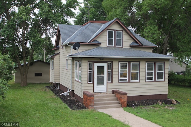 209 Cleveland St SW, Silver Lake, MN 55381 - bungalow-style house with roof with shingles and a front yard