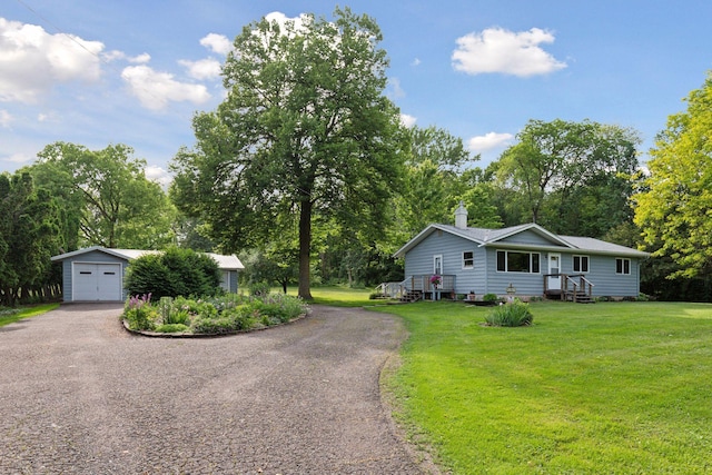 20240 Saint Croix Trl N, Scandia, MN 55073 - view of front of house with driveway, an outbuilding, view of wooded area, a front yard, and a chimney