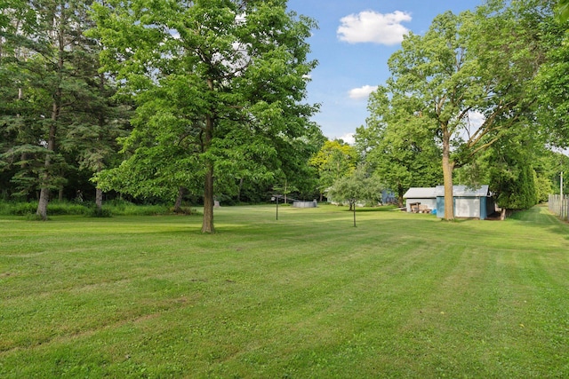 20240 Saint Croix Trl N, Scandia, MN 55073 - view of green lawn featuring an outdoor structure