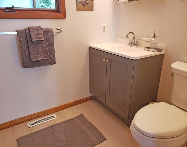 20758 Pike Ave, Aitkin, MN 56431 - bathroom with vanity and wood finished floors