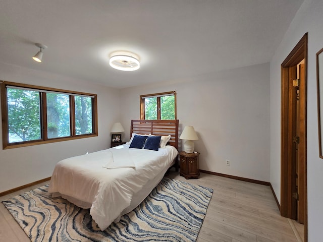 20758 Pike Ave, Aitkin, MN 56431 - bedroom featuring light wood finished floors and baseboards
