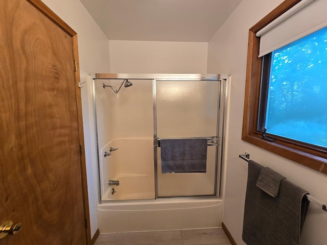 20758 Pike Ave, Aitkin, MN 56431 - bathroom with combined bath / shower with glass door and tile patterned flooring